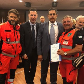 Protezione civile: premiati i volontari attivi nell'alluvione 2014