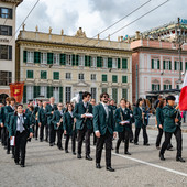 La formazione da parata della Banda Musicale Cittadina di Bolzaneto, inquadrata durante una sfilata per le vie del Centro Storico. La formazione da parata della Banda Musicale Cittadina di Bolzaneto, inquadrata durante una sfilata per le vie del Centro Storico.
