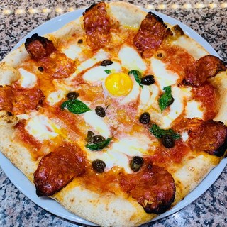 Per sdrammatizzare: a Genova si sforna anche la pizza "Coronavirus"