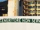 La scritta sui pannelli della recinzione del cantiere Esselunga a Sestri Ponente La scritta sui pannelli della recinzione del cantiere Esselunga a Sestri Ponente