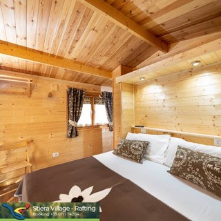 La vacanza immersa nella natura? Chalet, sauna, piscina, rafting, cavalli ed i monti intorno