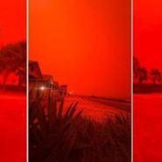 Cielo apocalittico in Australia, il ciclone Narelle tinge tutto rosso sangue: le immagini sono virali